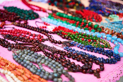 Street stall with handmade beads. Open air market.