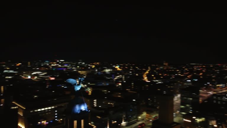 Aerial drone view of Liverpool city and port at night, United Kingdom