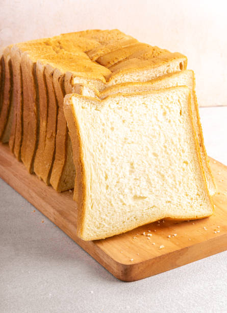 istock Stack of slice bread isolated on bright background. Close up. 1425956447