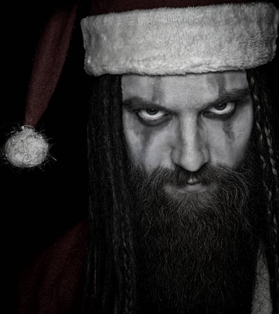 Portrait of angry Santa Claus over black background