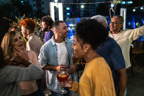 istock Happy friends together during party at night 1425963093