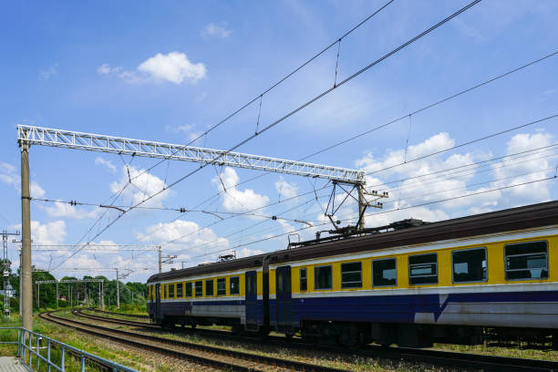 istock Vintage style electric passenger train runs on the tracks 1425966130