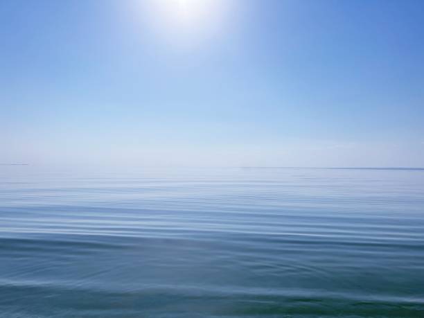 istock Blue sea water, clear sky, sun, horizon at the beach. 1425971684