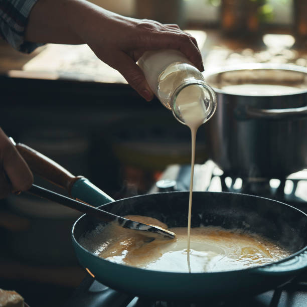 istock Preparing Fettuccine Pasta Alfredo with Parmesan 1425972057