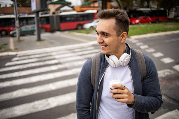 istock Student at the bus station 1425973897