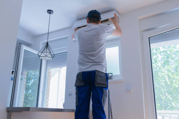 istock Male technician repairing air conditioner indoors. 1425978968