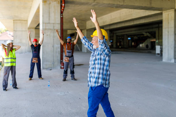 istock A Group of Multicultural Workers are Exercising During a Work and Stretching a Muscles. 1425979724