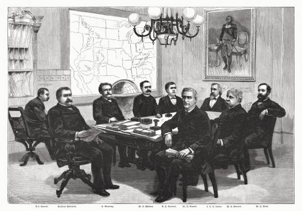Meeting of the ministry of the USA, woodcut, published 1885 Historical view of a meeting of the ministry of the United States of America. Nostalgic scene from the past. From left to right: Daniel Scott Lamont (1851 - 1905); Stephen Grover Cleveland (1837 - 1908); Daniel Manning (1831 - 1887); William Collins Whitney (1841 - 1904); Augustus Hill Garland (1832 - 1899); Thomas Francis Bayard (1828 - 1898); Lucius Quintus Cincinnatus Lamar (1825 - 1893); William Crowninshield Endicott (1826 - 1900); William Freeman Vilas (1840 - 1908).  Wood engraving, published  in 1885. grover cleveland stock illustrations