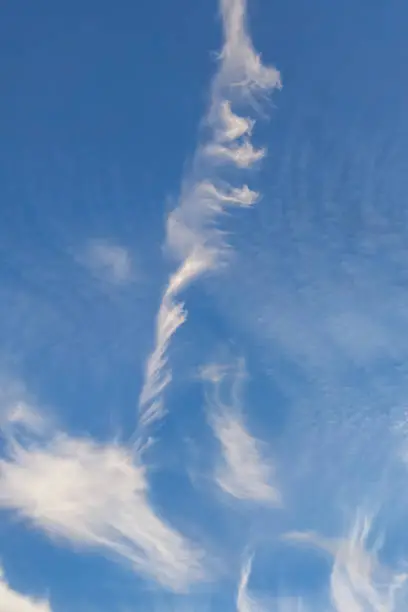 Cirrus cloud streak is blown away by the strong current high in the atmosphere.