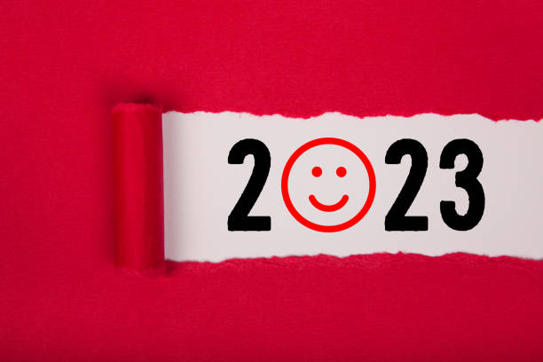 istock Torn Paper With Happy New Year 2023 On White Background 1425986991