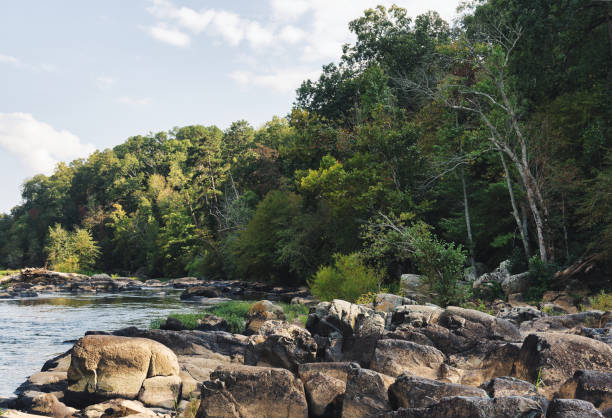 istock Rocky Riverbank Adventure 1425991800