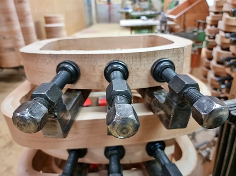 Glued wood pieces as early stage of assambling a handmade chair.