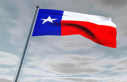 Texas Flag on a Cloudy Sky