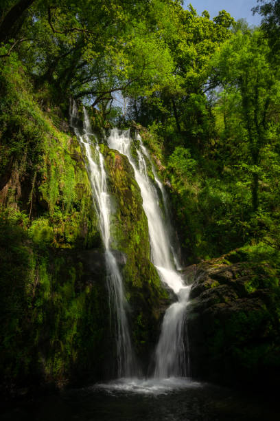 Oneta waterfalls natural monument on springtime in Asturias, Spain Oneta waterfalls natural monument on springtime in Asturias, Spain asturias photos stock pictures, royalty-free photos & images