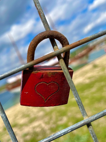 Close up of a love lock hanging outdoors