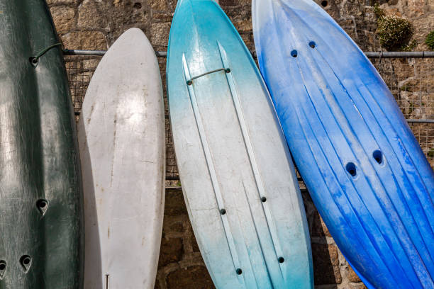 istock Surf boards standing against a wall waiting to be used 1425998310