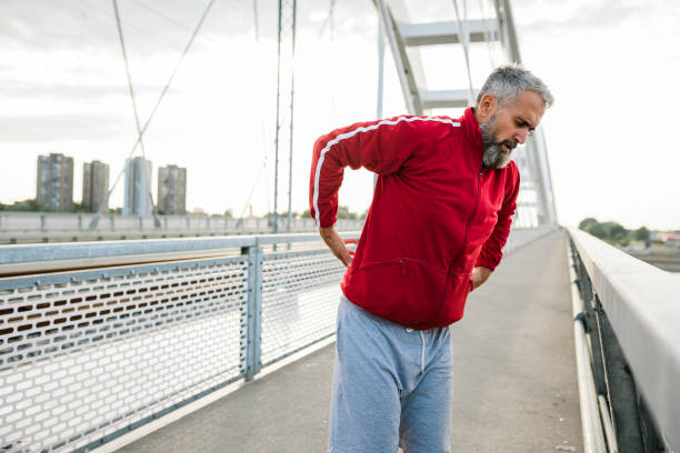 istock Senior sporty man having back pain 1426003841