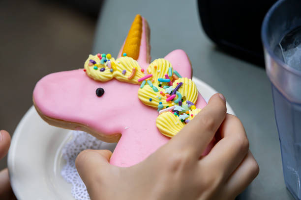 istock Unicorn cookie with sprinkles and frosting at a restaurant 1426004075