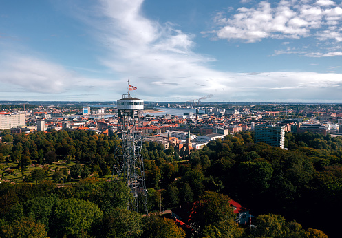 Panoramic summer cityscape of Aalborg (North Jutland, Denmark), with Aalborg Tower (Aalborgtårnet) in the foreground