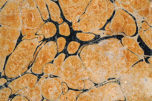 Old orange and black scuffed damaged marbled paper, Original over 150+ years old