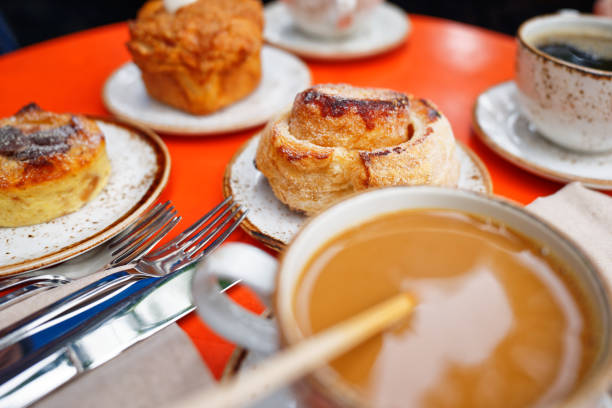 istock Enjoying a table full of bakery items and coffee 1426017516