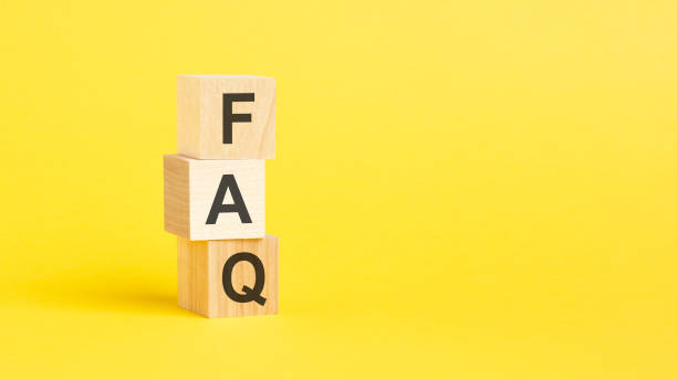 istock FAQ - text on wooden cubes, on yellow background 1426025616