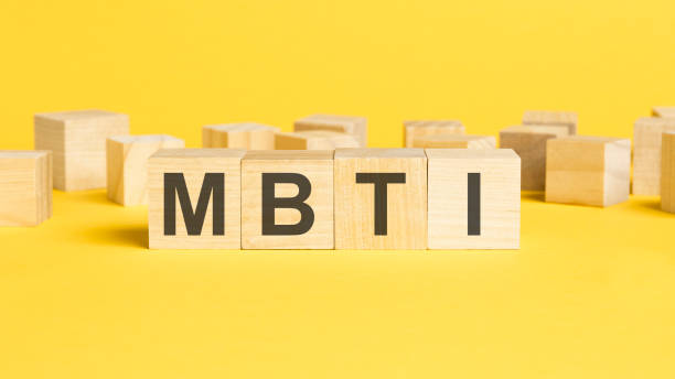 istock wooden cubes with MBTI text on yellow background 1426025679