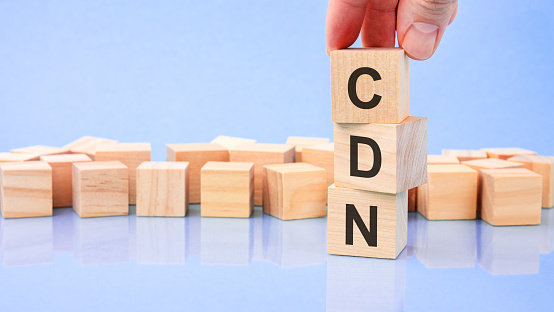 CDN text. financial, management, economic, business concept. CDN - short for content delivery network