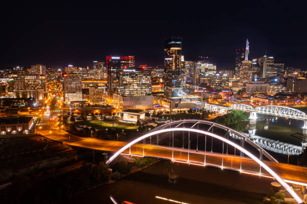Aerial Nashville, Tennessee An aerial drone shot of the Nashville skyline nashville tennessee bridge stock pictures, royalty-free photos & images
