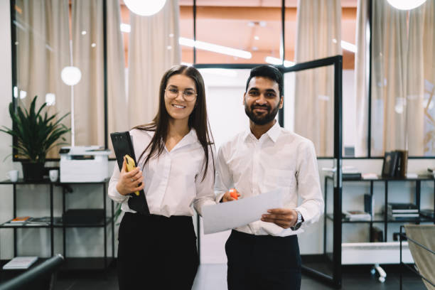 istock Positive multiethnic partners at work in office 1426032130