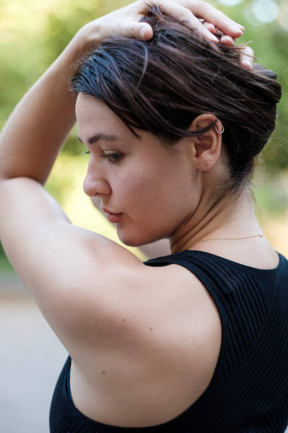 istock A young caucasian woman is posing while she is taking a break from doing yoga. 1426034434