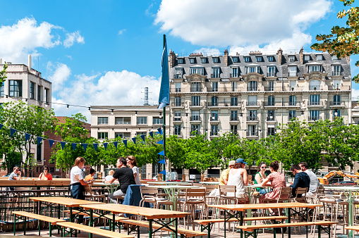Summer terrace near a canal in Bastille quarter - Paris