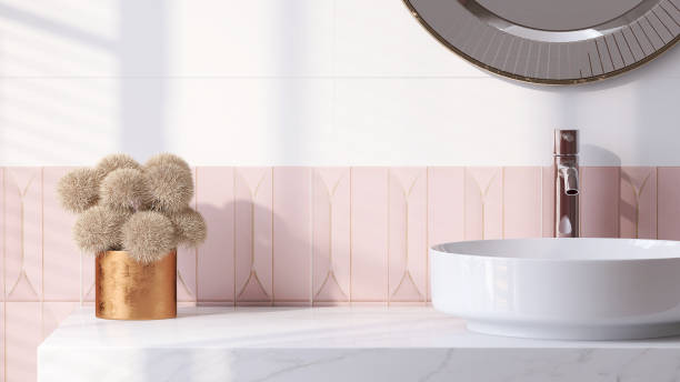 istock Modern and luxury bathroom vanity counter top with white round ceramic washbasin and mirror in sunlight from window with vase of flower 1426045132