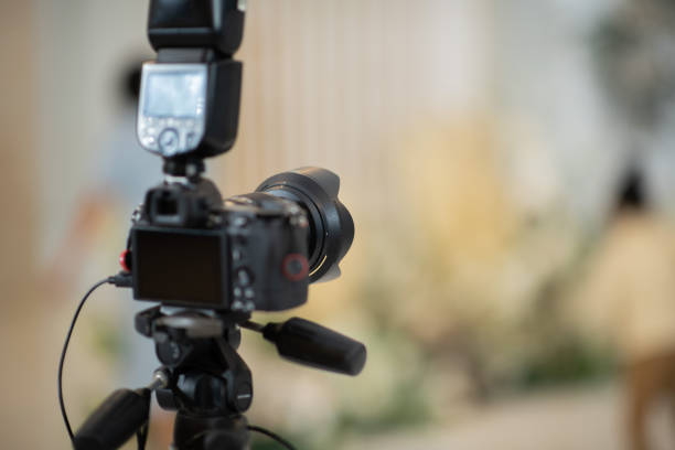 istock professional photographer, closeup digital camera 1426046502