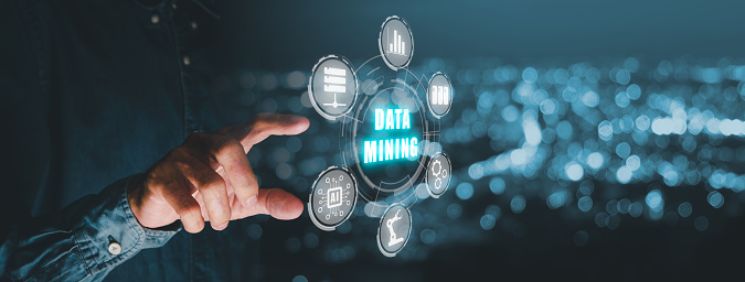 Data mining banner web icon for business and organization, Businessman hand touching data mining icon on VR screen, internet and networking concept.