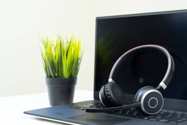 istock Headphone with laptop in office 1426054808