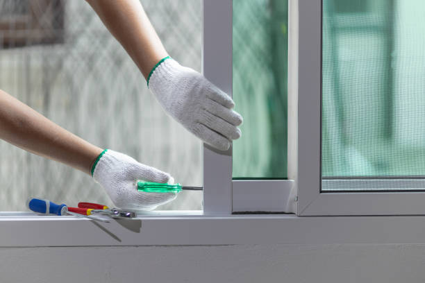 istock Construction worker repairing the sliding window. 1426058553