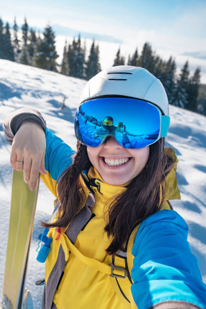 istock smiling skier woman portrait 1426060366