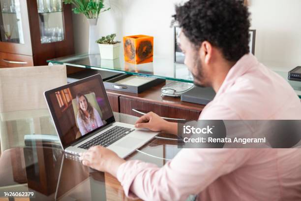 African American Young Man Doing Online Psychotherapy At Home Stock Photo - Download Image Now