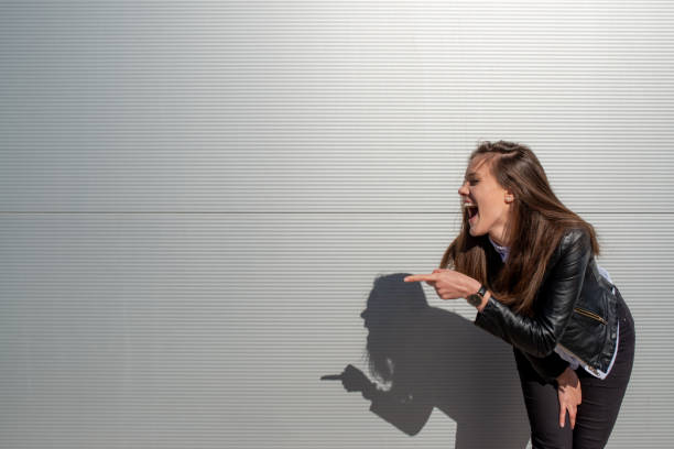 Woman pointing and teasing