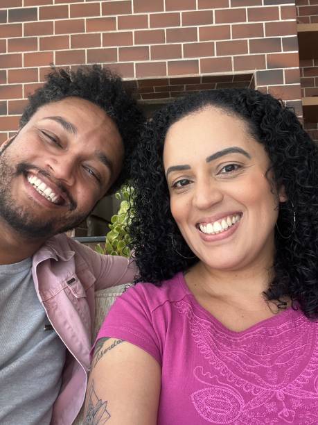 istock Heterosexual couple making selfie at home. POV 1426068024