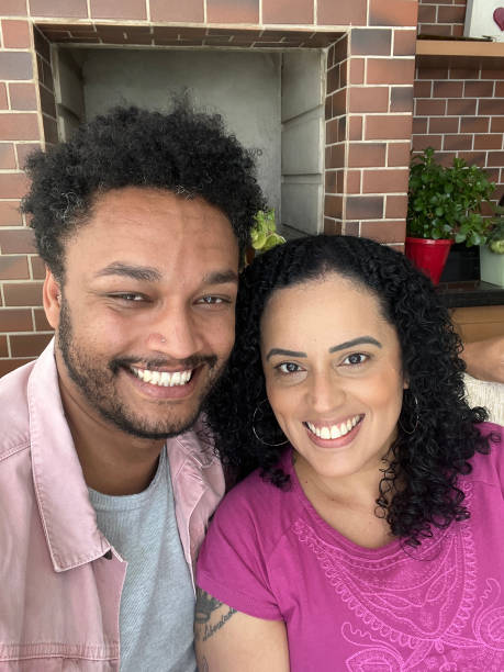 istock Heterosexual couple making selfie at home. POV 1426068027