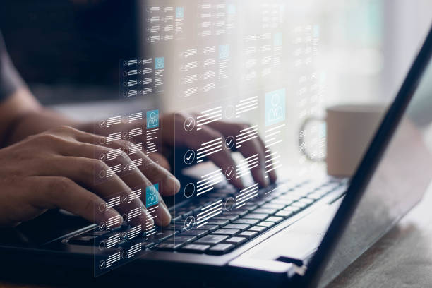 istock Human resources and management concept. Employees must complete the online survey form, answer the test questions, and Mark the checklist on a clipboard. Online business concept. 1426070859