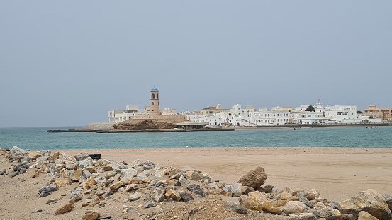 Sur, Oman – July 26, 2022: View at the coastline of the picturesque neighborhood of Al-Ayjah in Sur, Oman