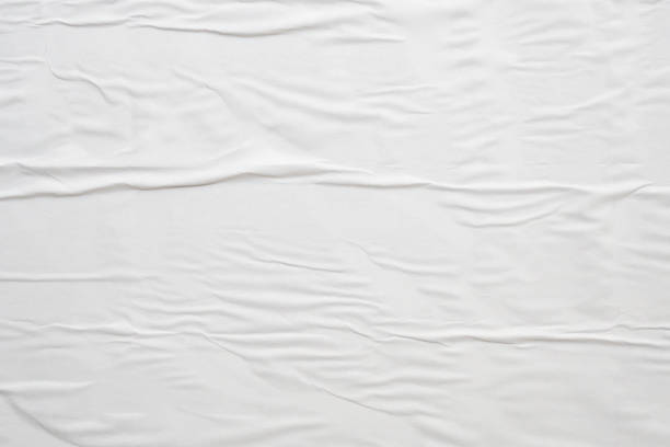 istock white crumpled and creased paper poster texture background 1426073096