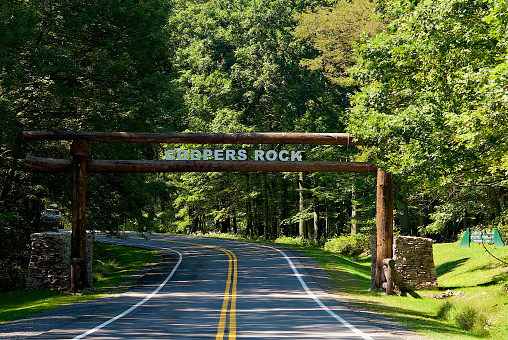Preston County, West Virginia, USA - September 20, 2022: A large wooden sign welcomes visitors to Coopers Rock State Forest on a sunny afternoon.