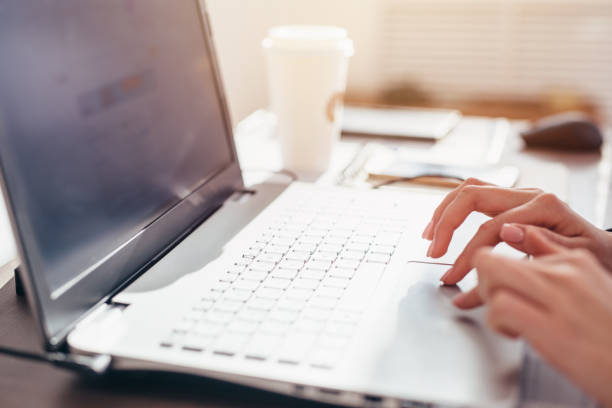istock Women's hands typing on a laptop keyboard 1426074669