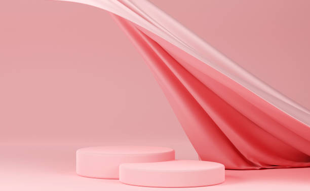 istock Pink pastel podium with pink flying fabric, cloth background 1426076588