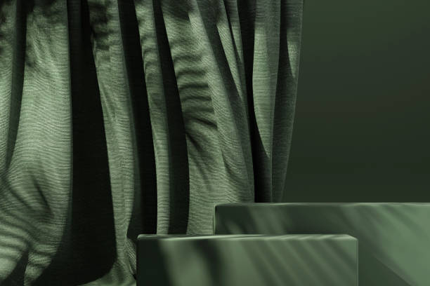 istock Dark green podium with green flying fabric, cloth background 1426077346