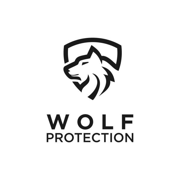 Wolf head and shield logo combination Wolf head and shield logo combination animals crest stock illustrations